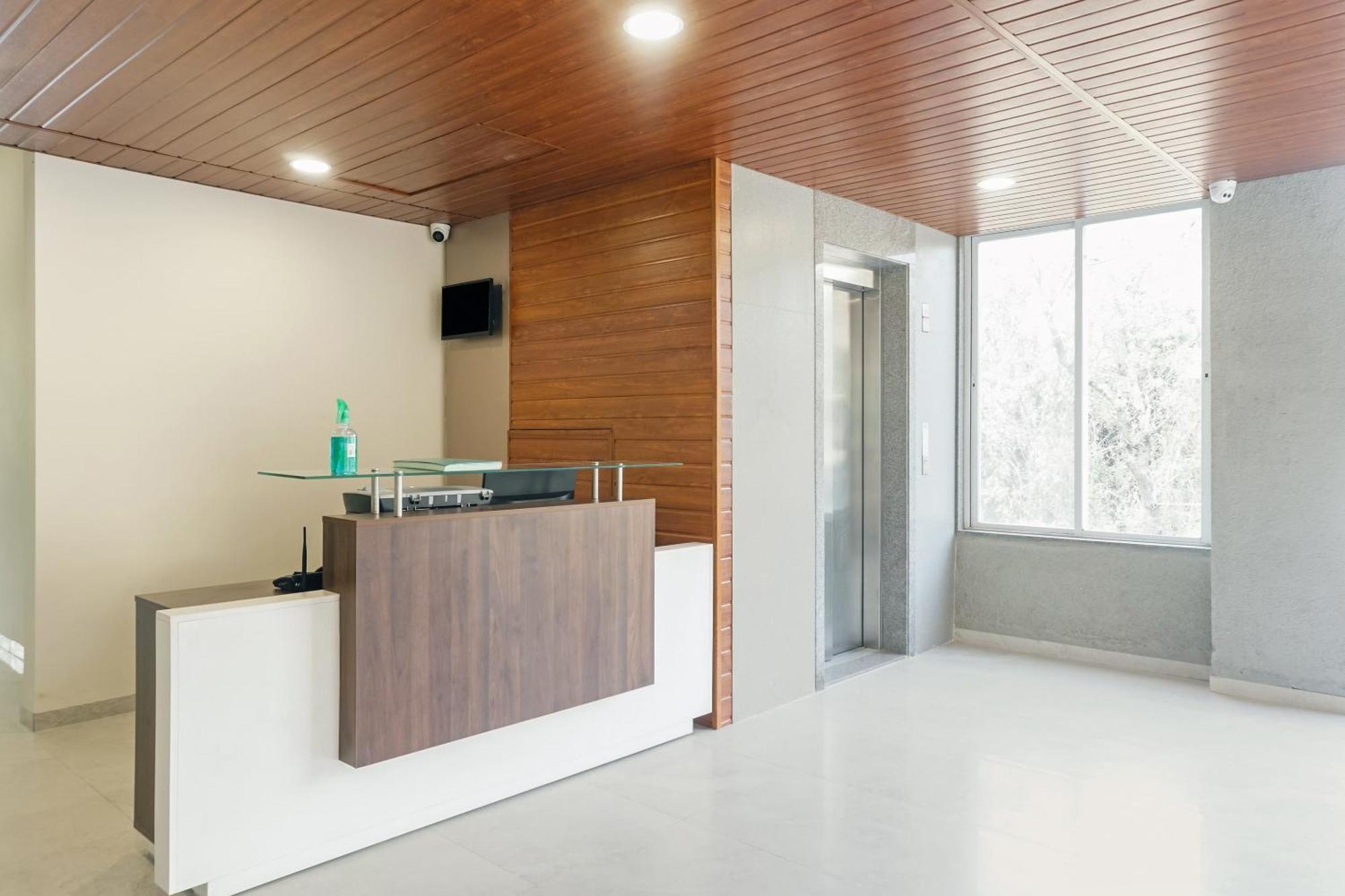 Hotel O Home Elegant Prime Ville Chinchvad Bagian luar foto